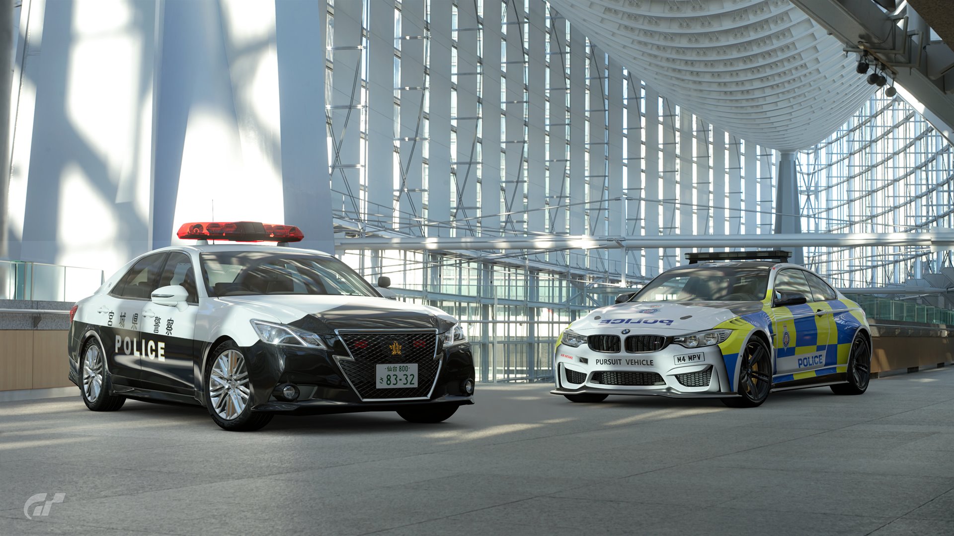 Two Japanese police cars at night